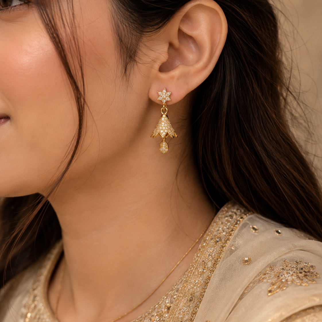 Gold Jhumka Earrings with CZ Stones